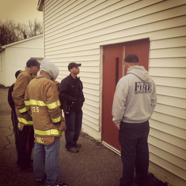 Crews on forced entry drill at local commercial building